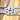 Close up of pilot family name metal sign with propeller, in raw steel.