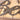 Close up of raw steel on Believe metal sign.