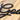 Close up of matte black powder coat on our God Bless script metal sign.
