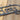 Close up of silver vein powder coat on our metal child name sign.