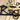 Close up of matte black powder coat on our metal child name sign.