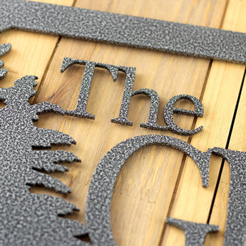 Close up of silver vein powder coat on our rectangular family name sign. 