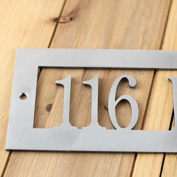 Close up of raw steel for rectangular metal address sign.