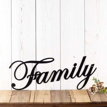 Metal family sign with script writing, in matte black powder coat. 