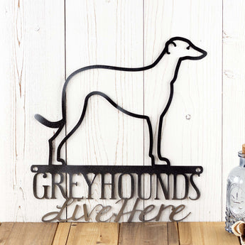 Close up of Greyhounds Live Here metal wall art, with Greyhound dog silhouette, in raw steel. 