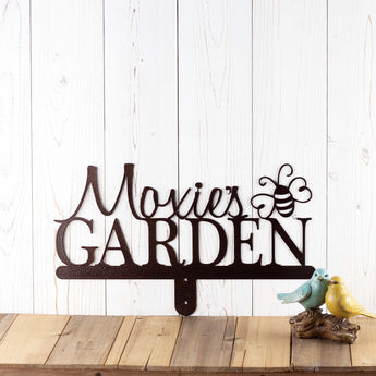 Garden name metal yard sign, with a bumble bee silhouette, in copper vein powder coat. 