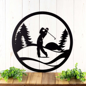Golf metal wall art with golfer and pine trees, in matte black powder coat.