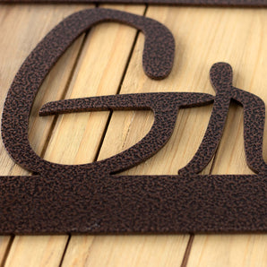 Close up of copper vein powder coat on our rectangular custom metal sign.