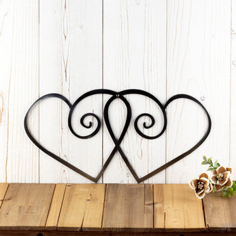 Hearts metal wall decor, in raw steel.