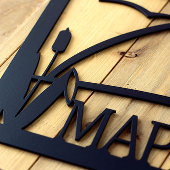 Close up of matte black powder coat on our rectangular metal address sign.