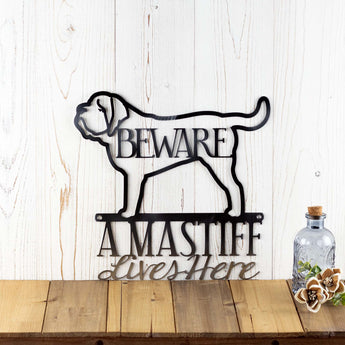 A Mastiff Lives Here metal wall art, with an English Mastiff and Beware, in raw steel.