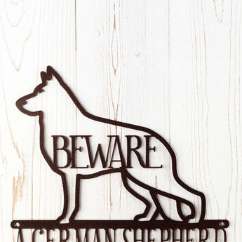 Close up of German Shepherd silhouette on our German Shepherds metal wall decor, in copper vein powder coat.