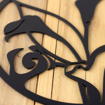 Close up of matte black powder coat on our Calla Lily metal wall art.