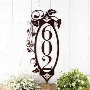 3 digit vertical metal house number sign with vines and fleur de lis, in copper vein powder coat. 