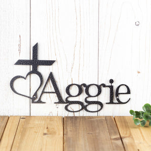 Memorial custom metal name plaque with a cross and heart, in silver vein powder coat.