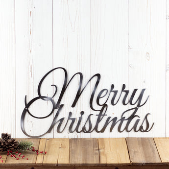 Merry Christmas script metal wall art, in raw steel. 