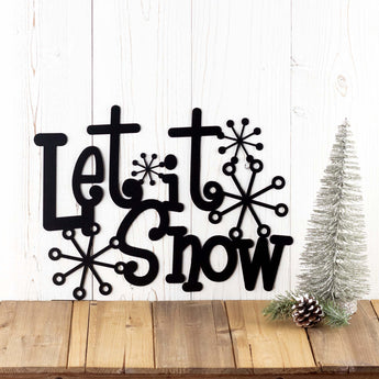 Let it Snow metal wall art with snowflakes, in matte black powder coat. 