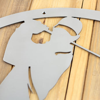 Close up of raw steel on our golfer metal wall decor.