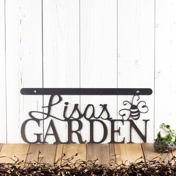 Personalized garden sign with first name and butterfly, in silver vein powder coat. 