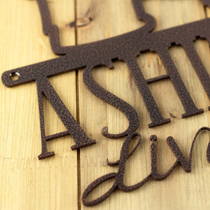 Close up of copper vein powder coat on our Shih Tzu Lives Here metal plaque.