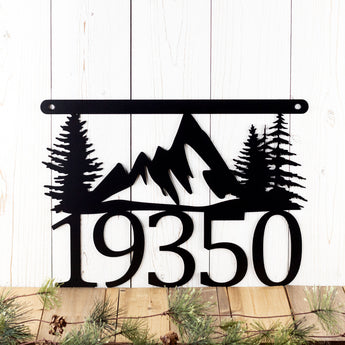 Hanging 5 digit metal house number sign with mountains and pine trees, in matte black powder coat. 