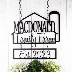 Custom farm metal sign with family name and established year, in matte black powder coat. 