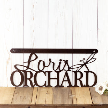 Hanging orchard metal sign with first name and dragonfly, in copper vein powder coat.