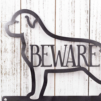 Close up of Rottweiler dog silhouette, with Beware, on our metal sign, in raw steel. 