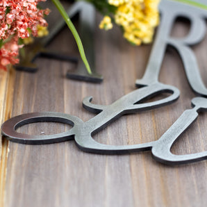 Close up of raw steel on our Rottweiler metal sign.