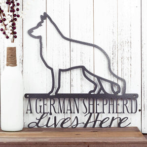 German Shepherds Live Here metal wall art, in raw steel.