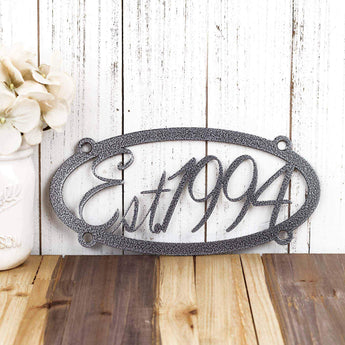 Oval established year metal sign, in silver vein powder coat. 