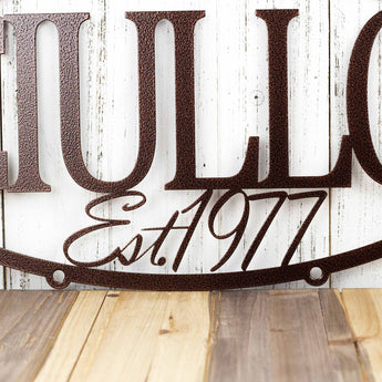 Close up of Established Year on our oval family name sign, in copper vein powder coat. 