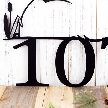 Close up of house number on our heron and cattails metal sign, in matte black powder coat. 