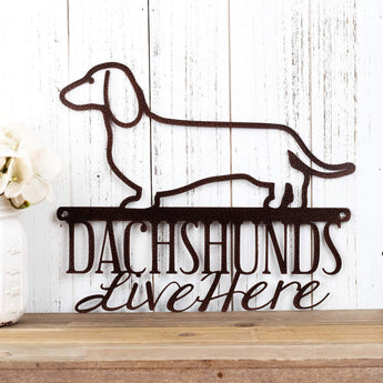 Dachshunds Live Here metal sign, in copper vein powder coat. 