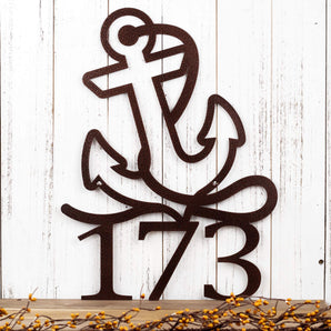 Metal house number sign with a nautical boat anchor, in copper vein powder coat.