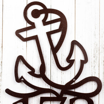 Close up of boat anchor on the metal house number sign, in copper vein powder coat. 