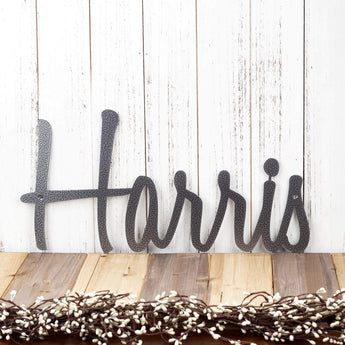 Custom metal name sign with script lettering, in silver vein powder coat. 
