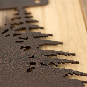 Close up of copper vein powder coat on our mountain metal house number plaque. 