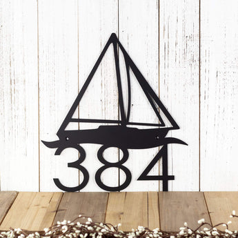 3 digit metal house number sign with sailboat silhouette, in matte black powder coat. 