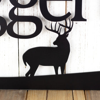 Close up of buck deer silhouette on our family name metal sign, in matte black powder coat.