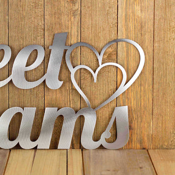 Close up of Hearts on our Sweet Dreams metal wall decor, in raw steel. 