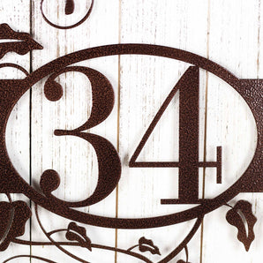 Close up of 2 digit metal house number on our metal address plaque, in copper vein powder coat.