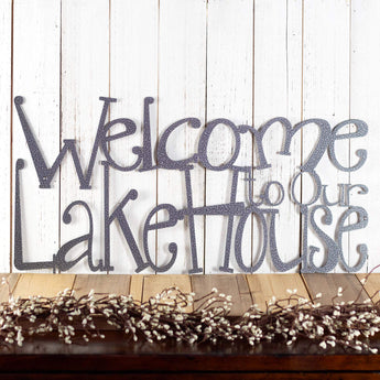 Welcome to Our Lake House metal wall decor, in silver vein powder coat. 