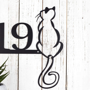 Close up of cat silhouette on our 3 digit metal house number plaque in matte black powder coat.