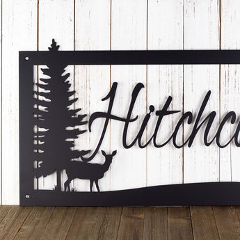 Close up of doe deer silhouette on our family name sign, in matte black powder coat. 