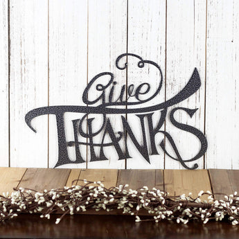 Give Thanks metal wall art with script lettering, in silver vein powder coat. 