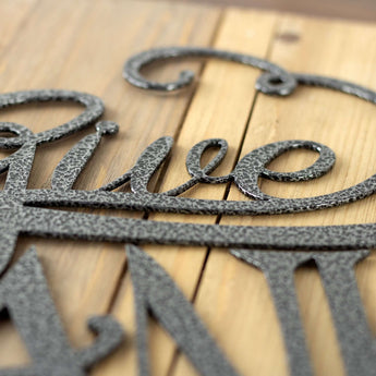 Close up of silver vein powder coat on our Give Thanks metal wall decor.
