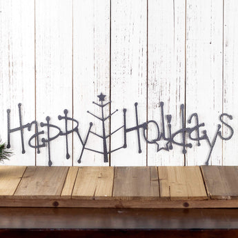 Happy Holidays metal wall art with Christmas tree, in silver vein powder coat. 