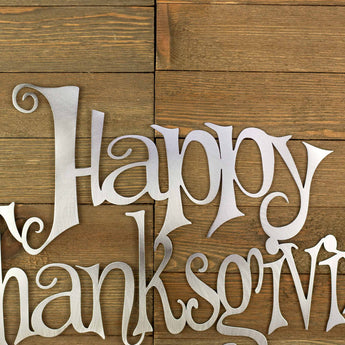 Close up of Happy on our Happy Thanksgiving metal sign, in raw steel.