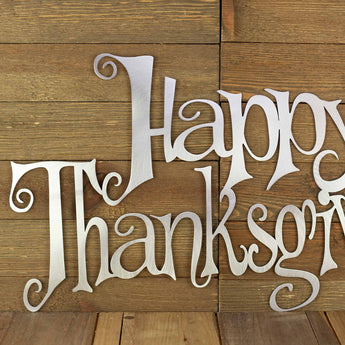 Close up of wording on our Happy Thanksgiving metal sign, in raw steel. 